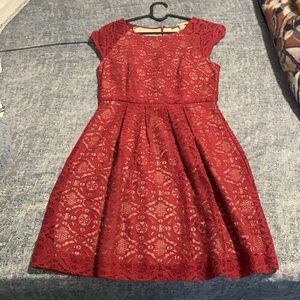 Simple yet elegant lace red dress with a light nude mesh.